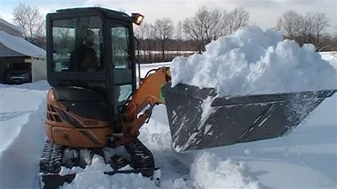 mini excavator snow removal|xboom snow removal system.